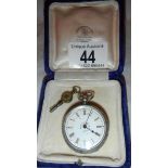 A ladies silver fob watch in working order, complete with key but incorrect box.
