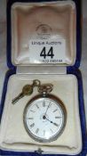 A ladies silver fob watch in working order, complete with key but incorrect box.