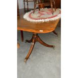 A mahogany double pedestal dining table.