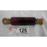 A ruby glass double ended scent bottle, one cap a/f.