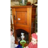 A mahogany pot cupboard.