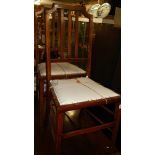 A pair of mahogany inlaid bedroom chairs (seat need recovering).