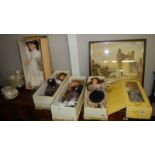 5 boxed porcelain collector's dolls.