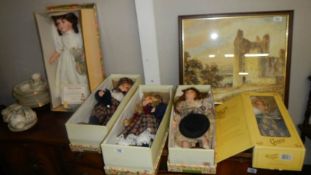 5 boxed porcelain collector's dolls.