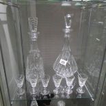 2 cut glass decanters and 6 glasses.