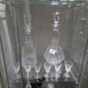 2 cut glass decanters and 6 glasses.