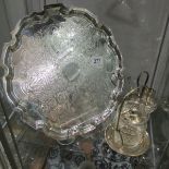 A silver plate tray, egg cup stand and conserve jar on plated stand.