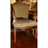 A cabriole leg arm chair.