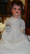 A German porcelain doll.