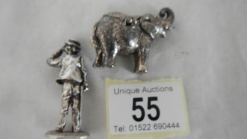 A hall marked silver figure and a silver plated pill box. - Image 2 of 3