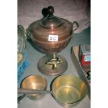 A copper samovar urn and 2 brass pans.