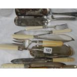A mixed lot of silver plate crumb scoops, fish knives and forks etc.