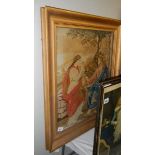 An old framed and glazed religious scene trapestry.