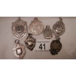 7 good silver fobs, all in good clean condition, approximately 89 grams.