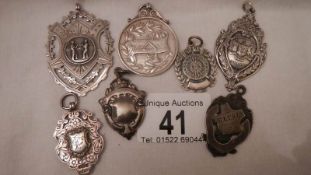 7 good silver fobs, all in good clean condition, approximately 89 grams.