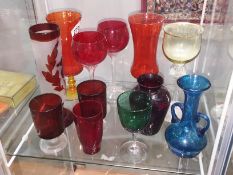 12 items of coloured glass including ruby.