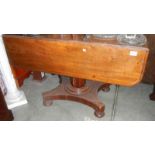 A mahogany Pembroke table.