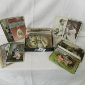 A quantity of old postcards.