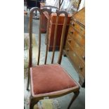 A mahogany inlaid chair.