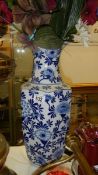 A blue and white floral pattern vase.