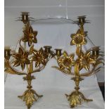 A good pair of gilded brass candelabra, 14" tall.