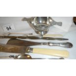 12 items of silver plate including wine ladle.