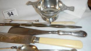 12 items of silver plate including wine ladle.