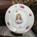 A large portrait cabinet plate.