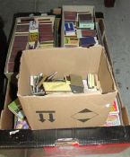 A large collection of matchboxes and box covers.