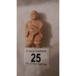 A Victorian ivory netsuke as a figure, signed on foot, in good condition, 2" tall.