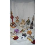 A mixed lot of perfume bottles including some enamelled.