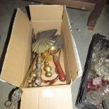 A box of brass fire implements etc.