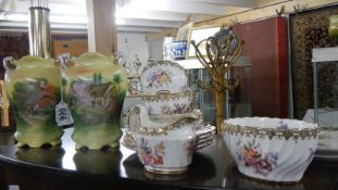 A pair of hand painted vases and a quantity of Copeland tea ware.