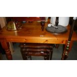 A pine kitchen table.