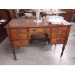 A mahogany writing desk.