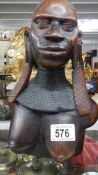 A carved hardwood African bust.