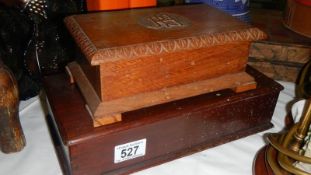 A carved oak box and a mahogany box.