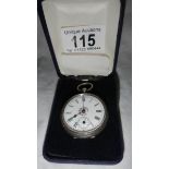 A ladies silver fob watch complete with key and in working order.