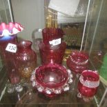 6 items of cranberry glass.