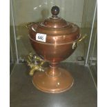 A copper samovar urn.