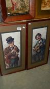 A pair of framed and glazed studies of old musicians.