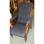 An Edwardian arm chair.