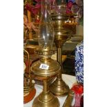 2 brass oil lamps.