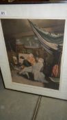 A framed and glazed print of an artist at work.