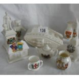 10 pieces of crested china including large tank, statue of Sir Francis Drake etc.