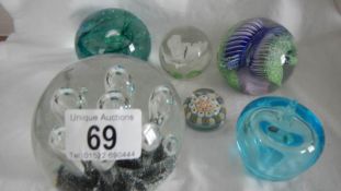 A quantity of old paperweights including millifiori.