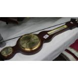A barometer/thermometer.