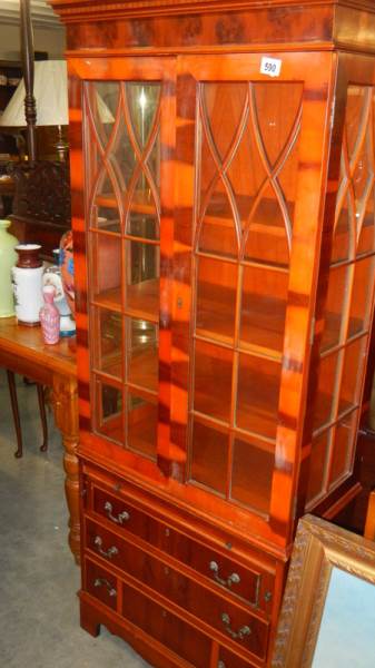 An astragal glazed cabinet.
