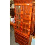 An astragal glazed cabinet.