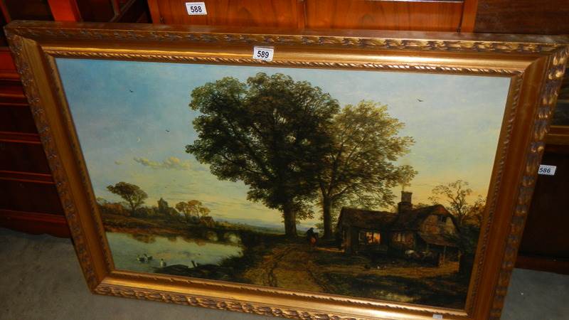A gilt framed oil on canvas rural scene.